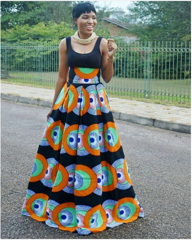 A full flare maxi colourful print Ankara high waist skirt with