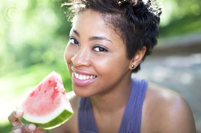 Image result for A Nigerian lady eating fruits