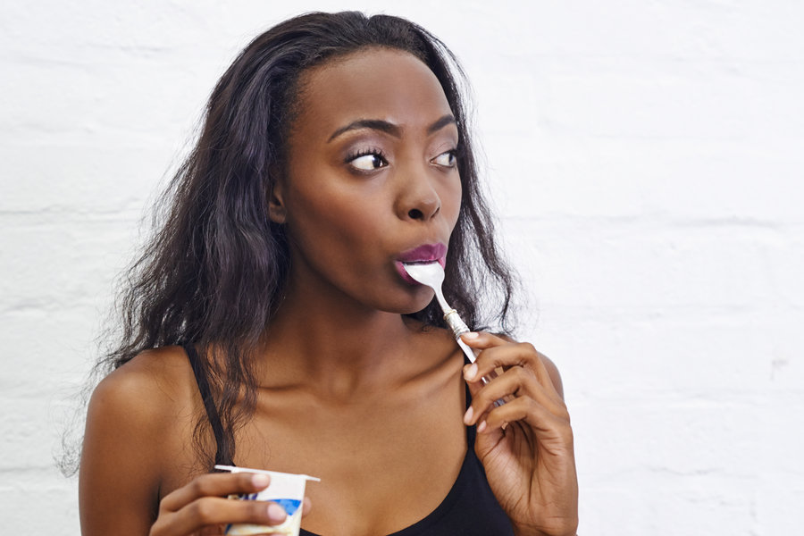 Image result for black woman taking yoghurt