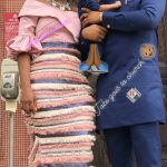 Powede Lawrence Dedicates Baby In church