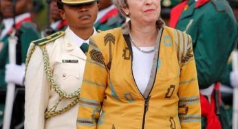UK Prime Minister, Theresa May In An Aso-Oke Jacket Is Everything You Need To See Today